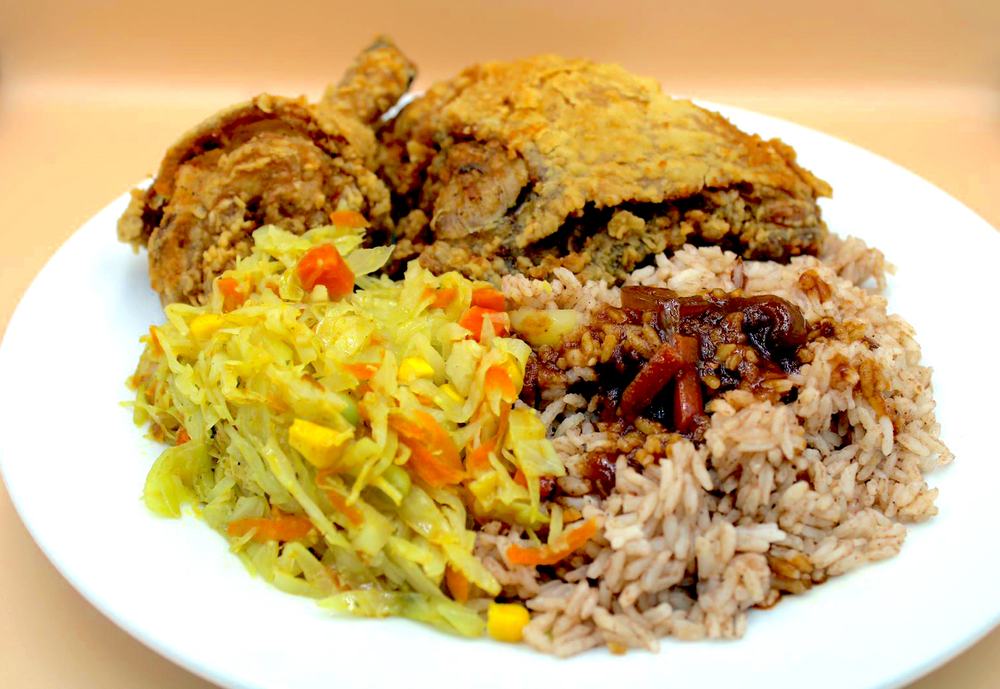 Fried chicken with rice and peas and cabbage